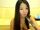 Cute Asian babe loves to jerk him off