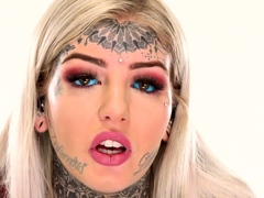 Behind the scenes for Amber Luke's new face tattoo